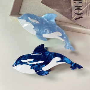 Orca shaped acetate hair claw clips with blue marble pattern for elegant hairstyles