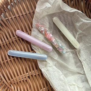 Set of four minimalist acetate French barrettes in soft pastel and floral colors