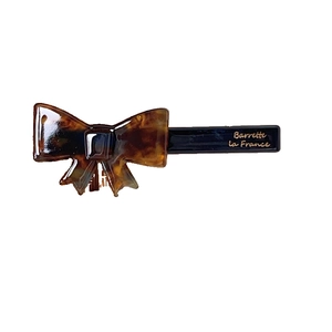 Elegant tortoise shell bow hair clip with golden Barrette La France text accent