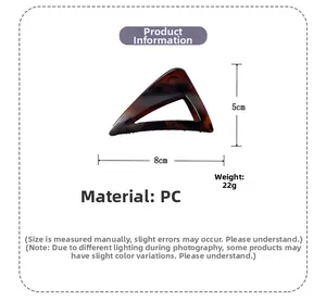 Detail view of tortoiseshell triangle hair claw clip showing 8cm length and PC material