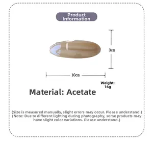 Detail view of oval acetate hair clip in beige showing dimensions 10cm by 3cm