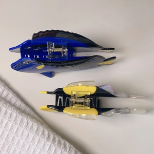 Creative tropical fish acetate hair claws in vibrant blue and yellow sea animal shapes