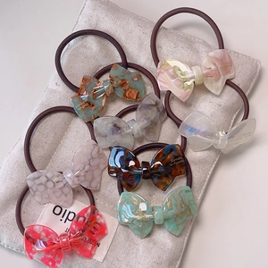 Elegant cellulose acetate bow hair tie set with marbled texture for women hair styling