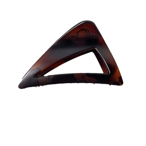 Minimalist triangle tortoise shell hair claw clip with cutout design on white background