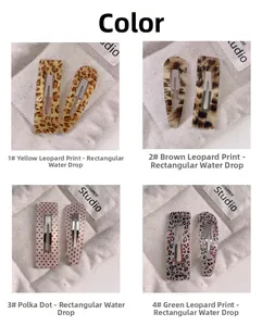 Close-up of leopard print and polka dot hair clip sets in rectangular and waterdrop shapes