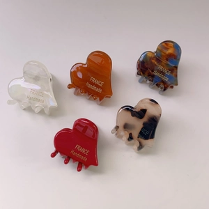 Set of 5 heart-shaped acetate hair claws in various vintage tortoise shell colors