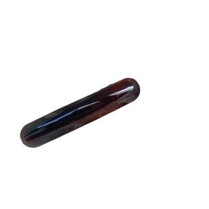 Elegant curved tortoiseshell hair clip with polished finish and gold logo on white background