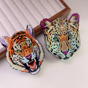 Minimalist animal acrylic hair claws featuring leopard and tiger head artistic designs
