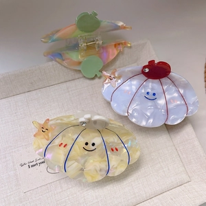 Cute acetate pumpkin hair claw clips with starfish and smiley face patterns for women