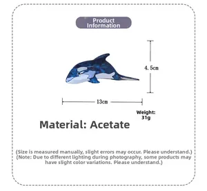 Orca shape acetate hair claw clip with blue marble texture measuring 13cm in length
