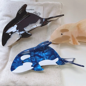 Orca and dolphin hair claws made of acetic acid material in black, cream, and blue colors