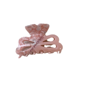 Pink marble acetate hair claw clip with rhinestones for high ponytail styles