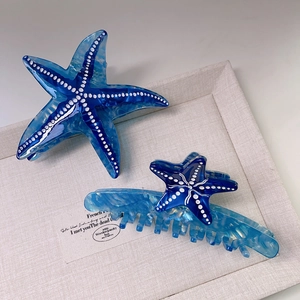 Elegantes Set aus blauen Acetat-Seestern-Haarklammern der Ozean-Serie