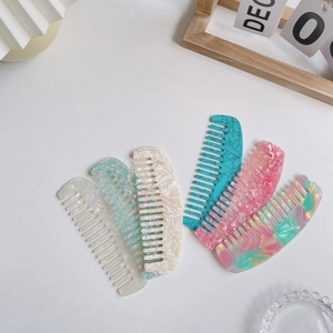 Eleganti pettini per capelli in acetato a denti larghi con motivi marmorei colorati