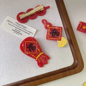 Lot de barrettes de Nouvel An avec lanterne rouge en acétate et motifs de sac de chance