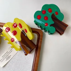 Creative tree-shaped acetate hair claw clips in green and yellow with red fruit accents