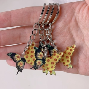 Cute butterfly keychains with yellow sunflower pattern and silver metal rings