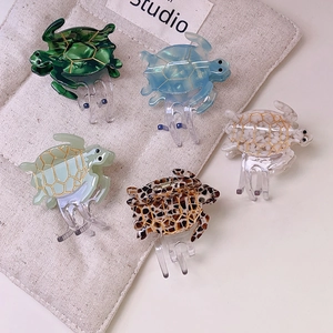 Elegant ocean series sea turtle hair claws in five colors with realistic gold textures