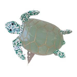 Green acetate turtle hair claw clip with gold shell patterns and elegant animal design