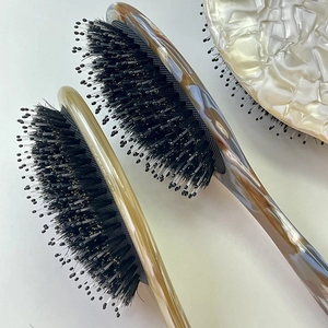 Premium acetate boar bristle paddle brushes with marble and tortoiseshell patterns