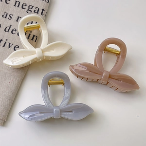 Pinces à cheveux nœud élégantes en crème, rose et gris-violet avec ressorts dorés