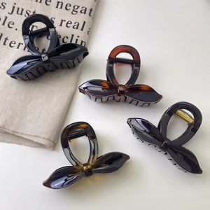 Pinces à cheveux élégantes avec nœud en écaille et crème pour accessoires de coiffure femme