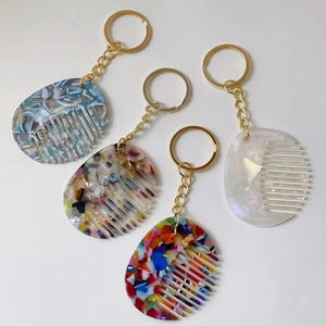 Mini acetate comb keychain in four colorful patterns with gold metal ring for women