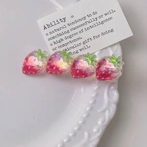 Set di quattro graziose mollette per capelli a fragola in resina rosa con glitter