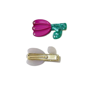 Barrettes tulipe 3D avec pétales violets et feuilles vertes, vues avant et arrière