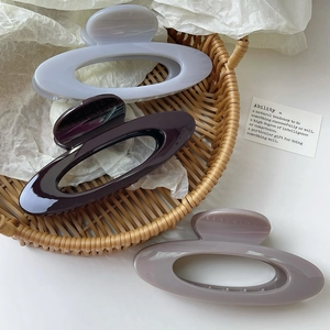 Three-piece set of elegant hollow oval hair claw clips in morandi purple tones