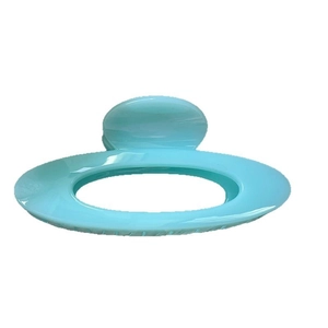 Elegant light blue oval hollow hair claw clip with glossy finish for women's hairstyle