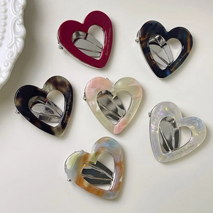 Chic hollow heart acetate hair clips in multiple marble patterns and colors