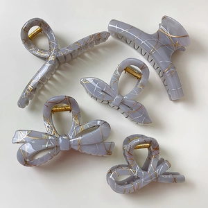 Set of five grey marble and gold foil lace bow hair claws for women hair styling