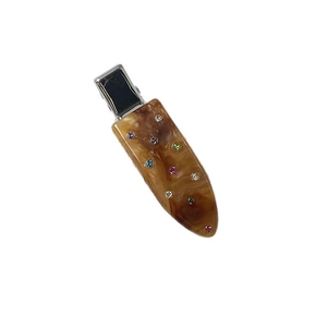 Elegant amber acetate hair clip with colorful rhinestones and silver metal spring grip