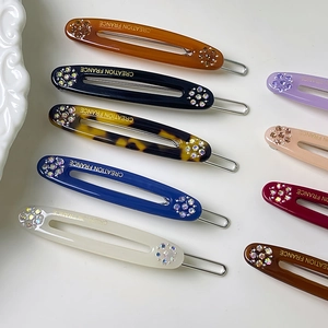 Elegante Blumen-Haarspangen in Gelee-Farben mit Strasssteinen und französischem Design