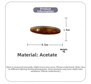 Dettagli dimensionali del fermaglio in acetato ambrato con strass e conchiglia d'oro