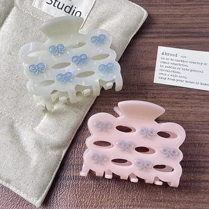 Elegant acetic acid butterfly bow hair claw clip in cream and pink colors for women