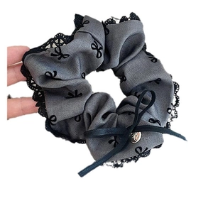 Grey oversized hair scrunchie with black lace trim and bowknot pattern design