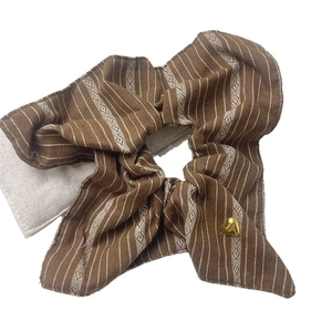 Brown striped scrunchie with vintage pattern and a gold heart pendant for women