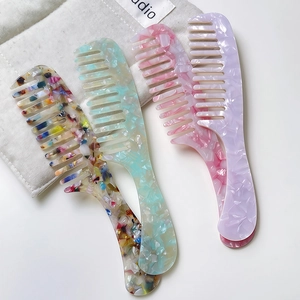 Chic marble pattern acetate wide-tooth combs with ergonomic handles in multiple colors