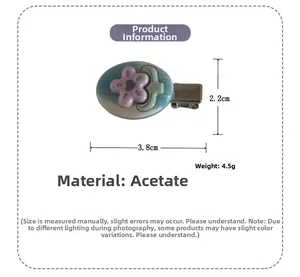 Detailed view of acetic acid flower hair clip with dimensions 3.8cm x 2.2cm and 4.5g weight