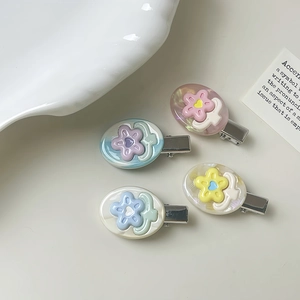 Set of four cute colorful floral hair clips in pastel dopamine colors for women