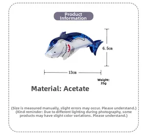 Detailed size view of the 13cm shark-shaped blue acetate hair claw clip showing 35g weight