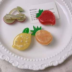 Cute fruit hair clips set including cherry strawberry lemon and pineapple designs
