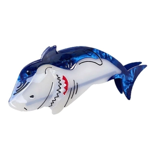 Shark-shaped acetate hair claw clip with ocean blue and white marble texture