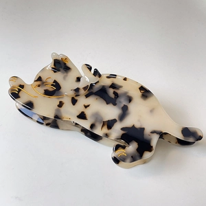 Cat shaped acetate hair claw clip with cream and black tortoiseshell pattern