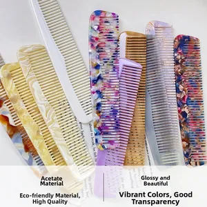 Close-up of marble pattern acetate hair combs with glossy finish and diverse textures