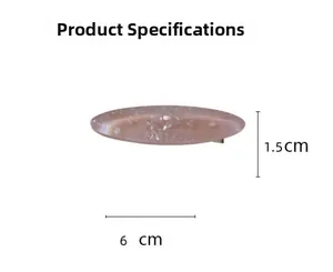 Detailed macro view showing the 6cm length and 1.5cm width of the pink resin hair clip