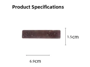 Detail view of floral hollow hair clip with rhinestones and 6.9cm size dimensions