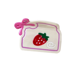 Pince à cheveux douce en acétate de cellulose avec motif fraise et nœud rose